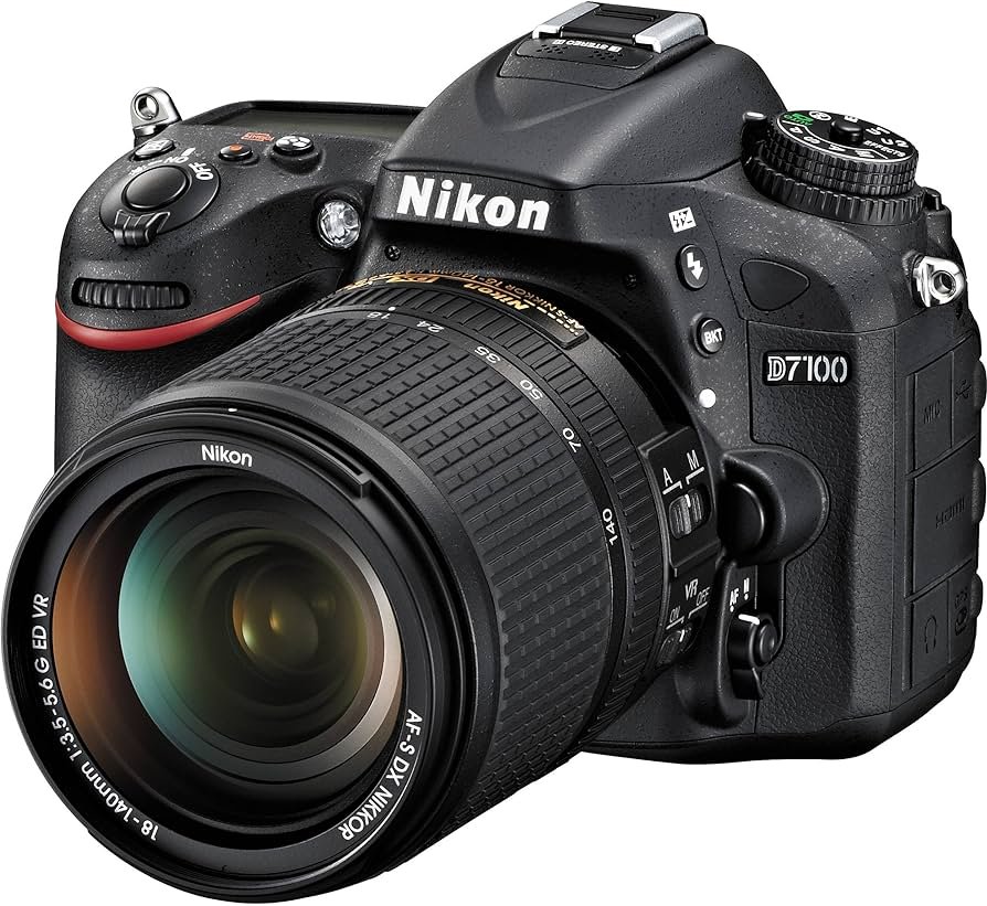 Nikon D7100 24.1 MP formato DX CMOS SLR digital con 0.709-5.512 in f/3.5-5.6G ED VR Auto Focus-S DX NIKKOR Lente de zoom